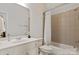 Clean bathroom featuring a single vanity, tiled shower-tub combination, and modern fixtures at 7507 Meadowgate Ln, Waxhaw, NC 28173