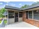 This covered porch offers a cool place to relax outside at 8024 Bradford Ln, Denver, NC 28037