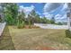 Large backyard with a white privacy fence surrounds the property at 8726 Addingham Dr, Charlotte, NC 28269