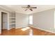 Bedroom with hardwood floors, natural light, and neutral walls at 9315 Pebble Creek Way, Charlotte, NC 28269