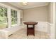 Cozy breakfast nook area with large window and neutral decor at 9315 Pebble Creek Way, Charlotte, NC 28269
