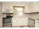 Well-equipped kitchen with stainless steel appliances at 9315 Pebble Creek Way, Charlotte, NC 28269