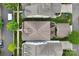 An aerial view showcases an outdoor patio area and well-maintained yard in a suburban setting at 10401 Royal Winchester Dr, Charlotte, NC 28277
