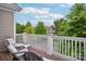 Relaxing balcony with comfortable seating, offering an inviting outdoor space at 10401 Royal Winchester Dr, Charlotte, NC 28277
