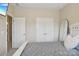 Bedroom featuring neutral paint, carpet, and an ensuite bathroom at 10401 Royal Winchester Dr, Charlotte, NC 28277