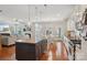 Spacious eat-in kitchen with an island, stainless appliances, and hardwood floors at 10401 Royal Winchester Dr, Charlotte, NC 28277