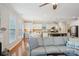 Open concept design featuring living room, dining area, and kitchen with modern appliances at 10401 Royal Winchester Dr, Charlotte, NC 28277
