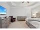 The main bedroom showcasing a TV, leather chair, and beautiful dressers at 10401 Royal Winchester Dr, Charlotte, NC 28277