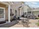 Great patio area with grill and dining set, ideal for outdoor entertaining at 10401 Royal Winchester Dr, Charlotte, NC 28277