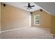 Bedroom with a fan, window, and speakers in the ceiling at 10616 Back Ridge Rd, Charlotte, NC 28277