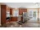 Kitchen featuring stainless steel appliances and a breakfast bar at 10616 Back Ridge Rd, Charlotte, NC 28277
