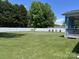 Spacious backyard with a lush lawn and a privacy fence, perfect for outdoor enjoyment at 1119 Balls Creek Rd, Claremont, NC 28610