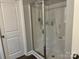 Bright bathroom with a glass-enclosed shower and modern fixtures at 1119 Balls Creek Rd, Claremont, NC 28610