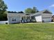Attractive single-story home with lush green lawn and a two-car garage at 1119 Balls Creek Rd, Claremont, NC 28610
