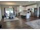 Modern open kitchen featuring stainless steel appliances and an island with bar seating at 1119 Balls Creek Rd, Claremont, NC 28610