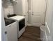Efficient laundry room with modern washer and dryer, offering convenience and functionality at 1119 Balls Creek Rd, Claremont, NC 28610