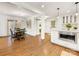 Open-concept space with a modern kitchen and dining area, featuring hardwood floors and natural light at 1300 Rutledge Ave, Charlotte, NC 28211