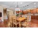 Open concept dining room offers hardwood floors, and easy access to the kitchen and living areas at 1328 Huntcliff Dr, Waxhaw, NC 28173