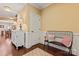 Inviting entryway featuring hardwood floors, a decorative bench, and a glimpse into the dining area at 1328 Huntcliff Dr, Waxhaw, NC 28173
