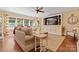 Relax in this cozy living room with a ceiling fan and a decorative built-in media center at 1328 Huntcliff Dr, Waxhaw, NC 28173