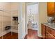 Walk-in pantry provides ample storage space with metal shelving for all your kitchen needs at 1328 Huntcliff Dr, Waxhaw, NC 28173
