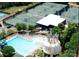 Stunning aerial view showcasing the community pool, clubhouse, and tennis courts, promising an active lifestyle at 1428 Spring Ridge Ln, Denver, NC 28037