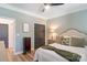 Comfortable bedroom featuring a wooden bed, elegant nightstands, and serene wall colors at 1428 Spring Ridge Ln, Denver, NC 28037