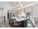 Bright kitchen features a large island, stainless steel appliances, pendant lighting and ample cabinet space at 1428 Spring Ridge Ln, Denver, NC 28037