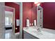 Bathroom features a bright vanity and a doorway leading to a bedroom in the background at 154 Patterson'S Bridge None, New London, NC 28127