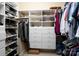 Organized walk-in closet showcasing custom shelves, drawers, and hanging rods for efficient storage at 154 Patterson'S Bridge None, New London, NC 28127