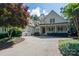 Charming two-story home featuring an attached garage, covered porch, and inviting curb appeal at 154 Patterson'S Bridge None, New London, NC 28127