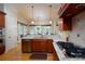 Gourmet kitchen features an island with counter seating and stainless steel appliances at 154 Patterson'S Bridge None, New London, NC 28127