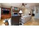 Comfortable living room showcasing a stone fireplace, built-in shelving, and plush seating at 154 Patterson'S Bridge None, New London, NC 28127