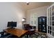 Office features plantation shutters, hardwood floors, and an adjacent door at 154 Patterson'S Bridge None, New London, NC 28127