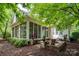 This patio features a seating area, beautiful landscaping, and a view of the house at 154 Patterson'S Bridge None, New London, NC 28127