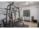 Home gym with weight rack, ceiling fan, and window at 1774 Smyrna Ln, Catawba, NC 28609