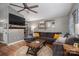 Cozy living room with a plush sectional sofa, decorative wall art, and a ceiling fan at 1774 Smyrna Ln, Catawba, NC 28609