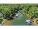 Scenic aerial view of waterfront property with boat docks at 188 Stonemarker Rd, Mooresville, NC 28117