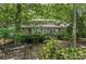 Home with a well-maintained yard, mature landscaping, and an inviting entrance at 188 Stonemarker Rd, Mooresville, NC 28117