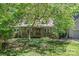 Charming home with a covered front porch and a beautiful, landscaped front yard at 188 Stonemarker Rd, Mooresville, NC 28117
