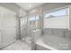 This bathroom has a soaking tub and a glass enclosed shower stall at 1918 Thoreau Way, York, SC 29745