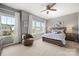 Inviting bedroom with large windows, natural light, and a cozy chair at 1918 Thoreau Way, York, SC 29745