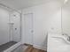 Bathroom with a glass-enclosed shower, a vanity, and wood-look flooring at 2025 Sweet Magnolia Ln, Clover, SC 29710