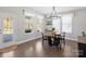 Bright dining room with ample natural light and access to the outdoor space at 2025 Sweet Magnolia Ln, Clover, SC 29710
