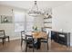 Cozy dining room with chandelier lighting and built-in desk area at 2025 Sweet Magnolia Ln, Clover, SC 29710