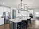 Stylish kitchen with large island, pendant lighting, and modern appliances at 2025 Sweet Magnolia Ln, Clover, SC 29710
