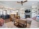 Bright living room featuring a fireplace, built-in shelving, and an open layout to the kitchen at 2025 Sweet Magnolia Ln, Clover, SC 29710