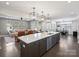 Open concept kitchen flows into a spacious living and dining area at 2025 Sweet Magnolia Ln, Clover, SC 29710