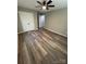 This bedroom offers plank flooring and a ceiling fan at 203 Blanche Ave, Belmont, NC 28012