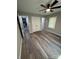 Bedroom with a ceiling fan, hardwood floors, and a closet at 203 Blanche Ave, Belmont, NC 28012